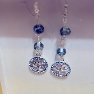 Earrings with the tree life